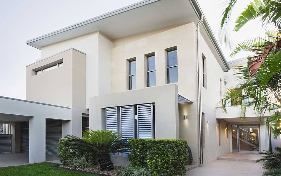 Freshly presented modern two-storey rendered home with a tidy front garden