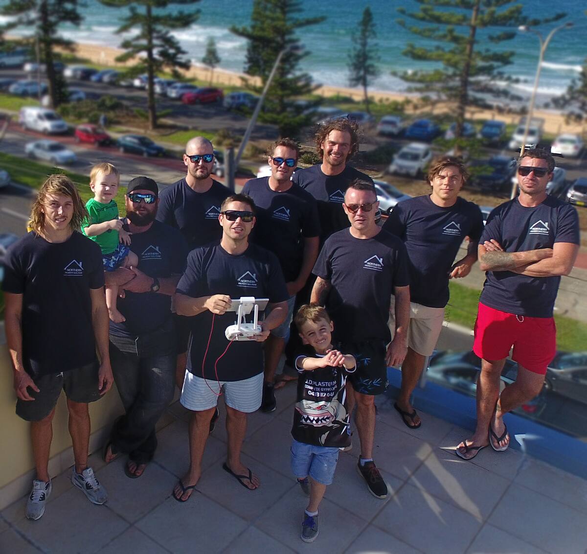 The Northern Property Solutions team in branded shirts on the Northern Beaches